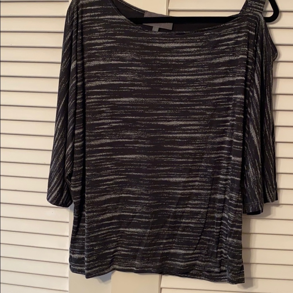 Cut out shoulder shirt.